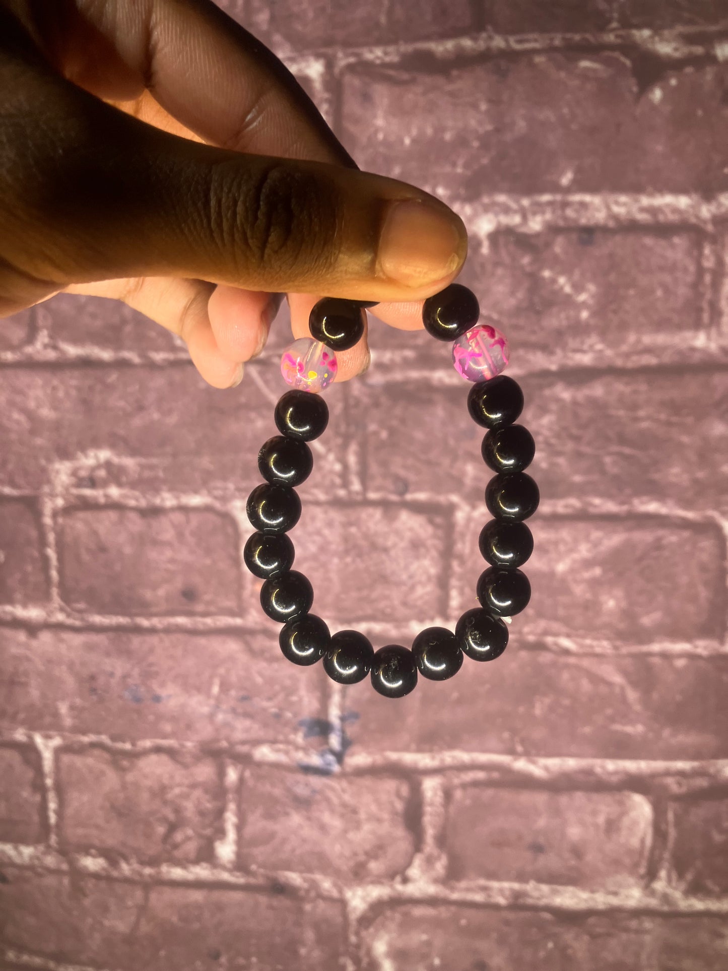Pink and black bracelet