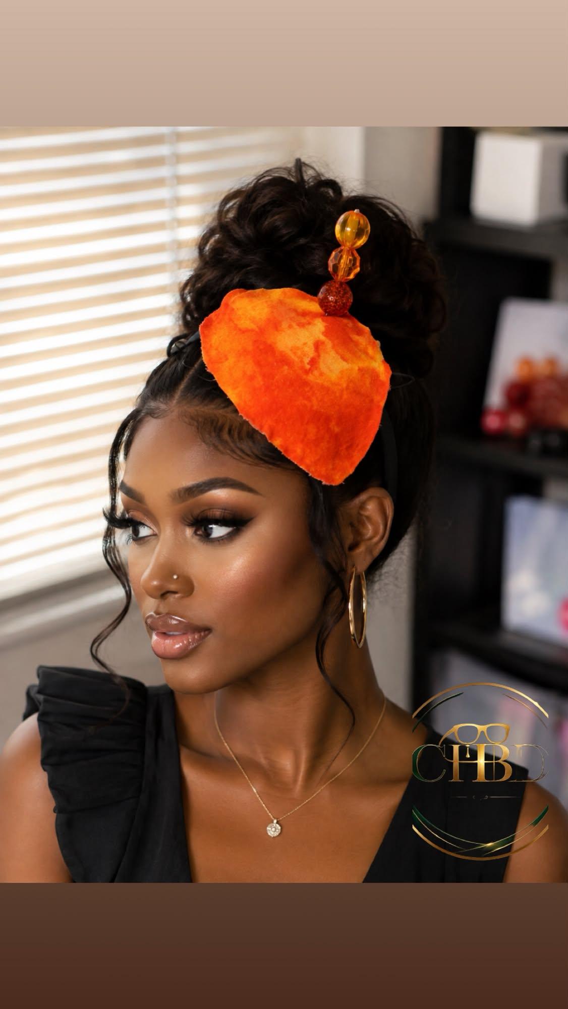 Orange fresh fire fascinator