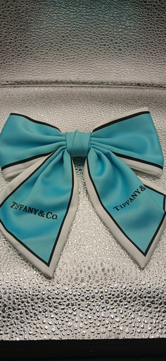 Blue t brooch