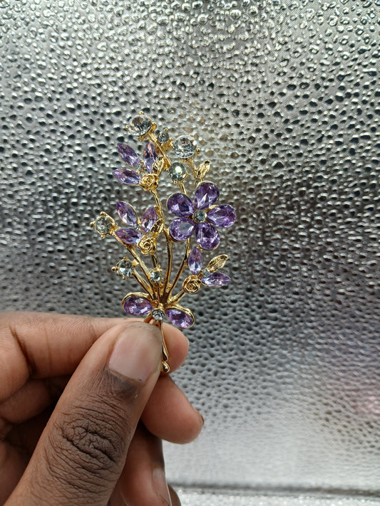 Purple gold brooch