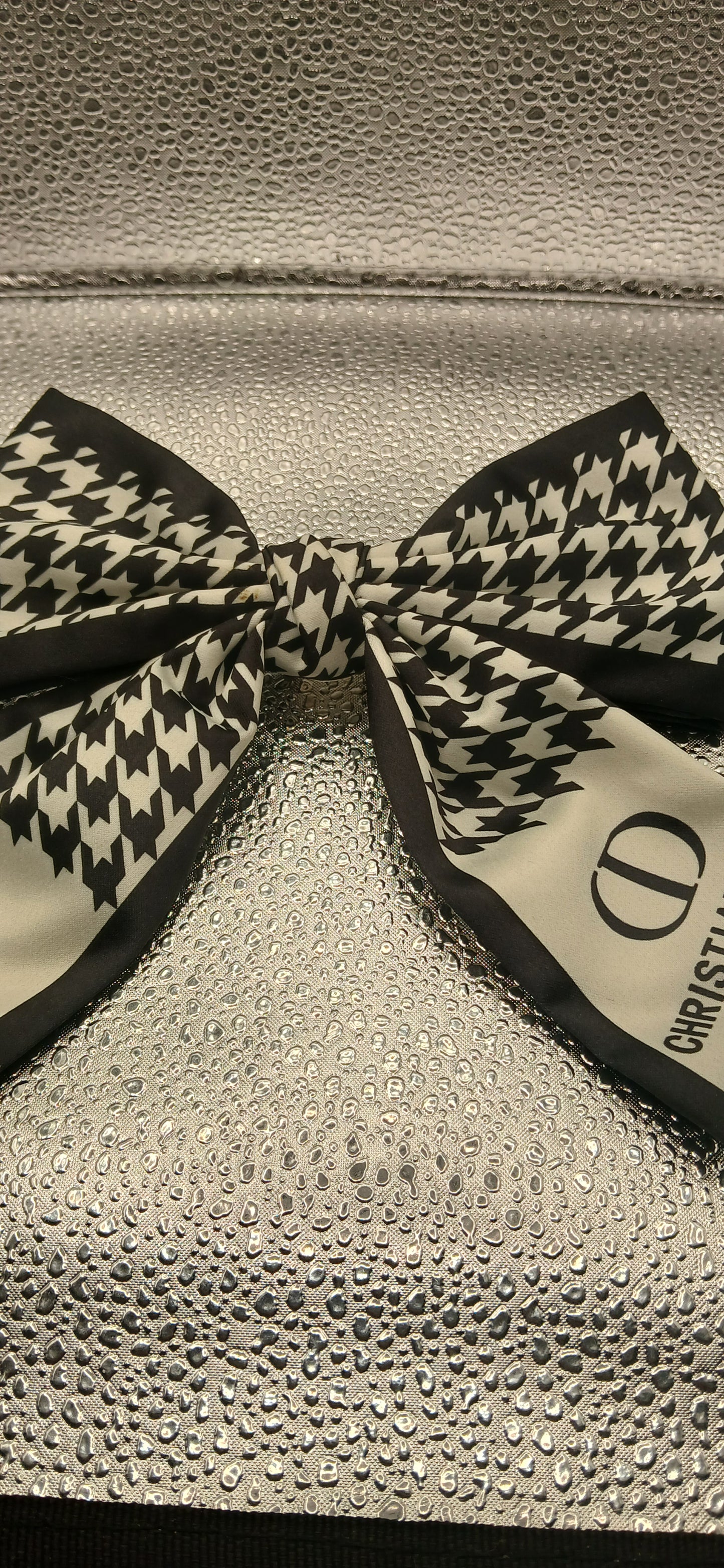 CD bow brooch